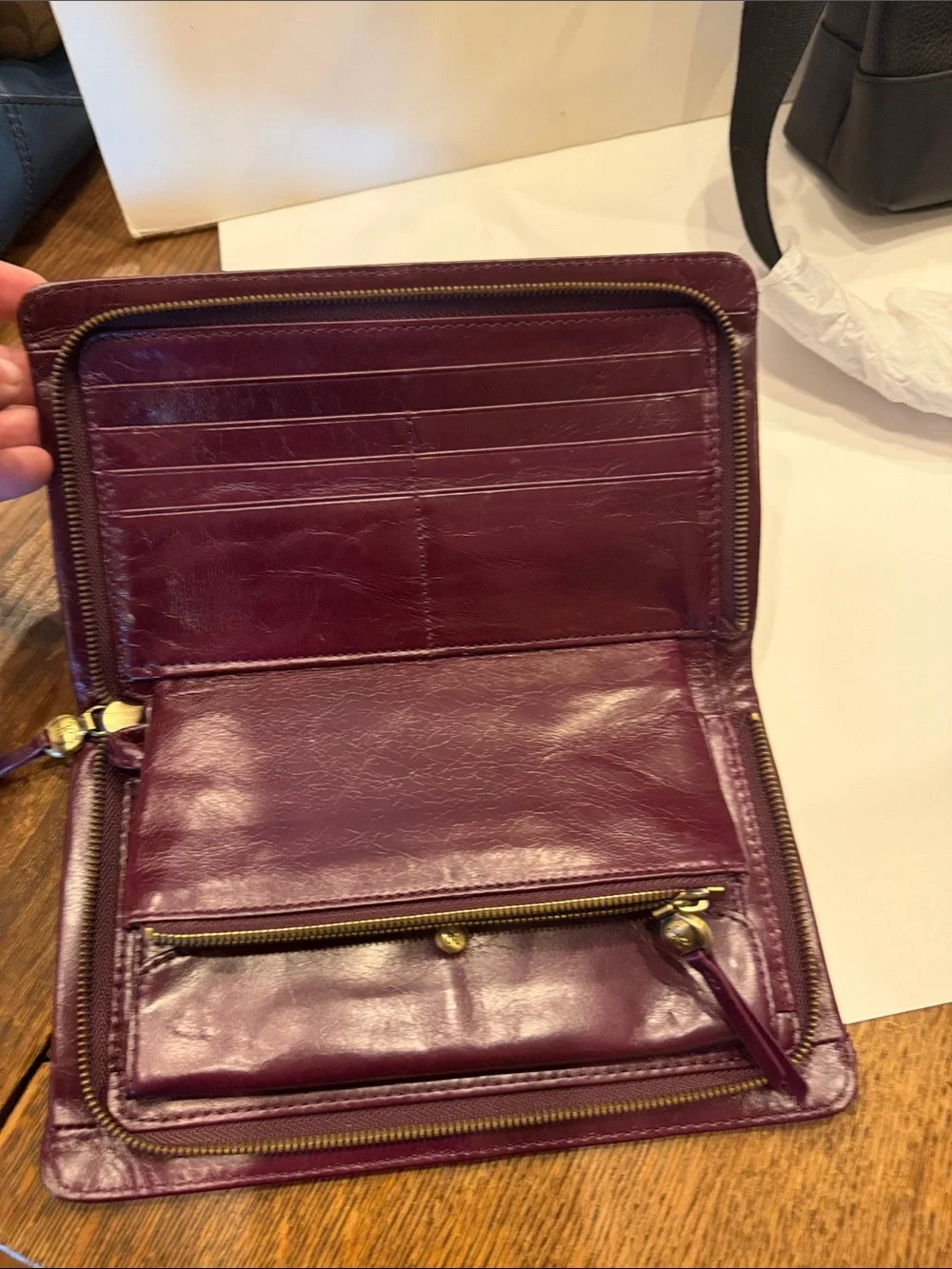 HOBO women’s Leather Clutch in Dark Plum